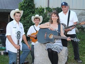 The Nelson Family are Sam Nelson on bass, Charlie Nelson on mandolin, vocalist Susan Nelson and family friend Pete Atkins on banjo. The Nelsons specialize in traditional bluegrass and gospel music. They will appear with five other groups this weekend at Purple Hill?s Bluegrass Opry Reunion.