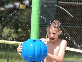 Wallaceburg's Austin Medd enjoys the Wallaceburg splash pad located at Colwell Park on Running Creek Drive on Sunday, August 13. The splash pad opened on the weekend after a couple years of fundraising and planning. The grand opening of the splash pad is scheduled for Aug. 19 at 12:30 p.m.