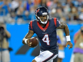 Deshaun Watson #4 of the Houston Texans rolls out against the Carolina Panthers during the preseason game at Bank of America Stadium on August 9, 2017 in Charlotte, North Carolina. (Grant Halverson/Getty Images)