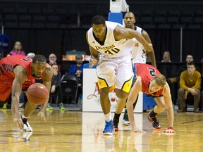 London Lightning player Sefton Barrett chases down a loose ball during a game against the Brampton A's at Budweiser Gardens in London, Ontario on Thursday, February 19, 2015. (Free Press file photo)