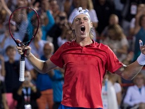 Denis Shapovalov of Canada celebrates after defeating Adrian Mannarino of France during quarter-final play at the Rogers Cup tennis tournament Friday August 11, 2017 in Montreal. The men's Rogers Cup set a record for attendance at a one-week tournament of 216,097 spectators. THE CANADIAN PRESS/Paul Chiasson