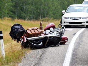 Traffic was at a halt Sunday afternoon after a bear caused vehicles to slow dramatically while taking a curve on the highway 15 minutes north of Waterton Lakes National Park. A motorcycle struck the back of a vehicle resulting in injuries. Two patients were transferred to hospital in Lethbridge. | Stephanie Hagenaars photo / Pincher Creek Echo