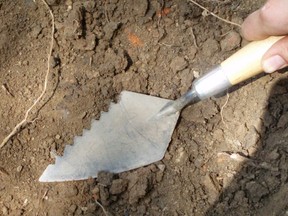 archaeological dig and tool