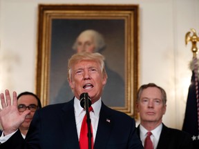 Alex Brandon/The Associated Press
U.S. President Donald Trump speaks during an event to sign a memorandum calling for a trade investigation of China on Monday in the Diplomatic Reception Room of the White House in Washington.