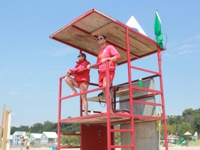 Lifeguards on duty at Port Stanley’s main beach keep watch for anyone in trouble in the water on Tuesday afternoon. Provincial drowning numbers have improved over last year. (Laura Broadley/Times-Journal)