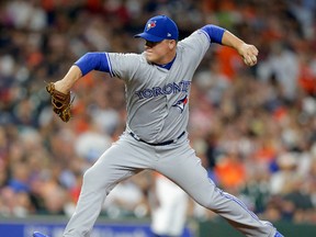 Aaron Loup of the Toronto Blue Jays pitches in the sixth inning against the Houston Astros at Minute Maid Park on Aug. 4, 2017. (Bob Levey/Getty Images)