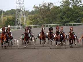 Canada’s James MacDonald (inset) added two wins to his World Driving Championships campaign last night at Georgian Downs. (Standardbred Canada photo)