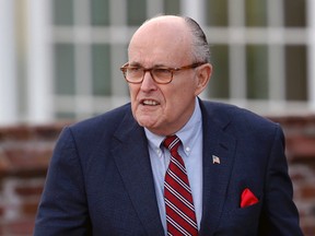 This Nov. 20, 2016 file photo shows former New York Mayor Rudy Giuliani arriving at the Trump National Golf Club Bedminster clubhouse in Bedminster, N.J. Giuliani was rushed to the hospital for emergency surgery over the weekend after falling while on vacation on Long Island on Sunday, Aug. 13, 2017. (AP Photo/Carolyn Kaster, file)