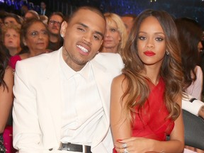 Chris Brown (L) and Rihanna attend the 55th Annual GRAMMY Awards at STAPLES Center on February 10, 2013 in Los Angeles, California. (Photo by Christopher Polk/Getty Images for NARAS)