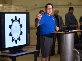 Dan Cassidy, who is developing The Factory Indoor Adventure Park in the old Kellogg's factory in London, Ontario, lays out his plans during a press conference on Wednesday August 16, 2017. (MORRIS LAMONT, The London Free Press)