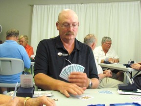 Paul Gateman, of Port Elgin, competes in bridge Wednesday Aug. 16, 2017 at the Strangway Community Centre in Sarnia, Ont., during the 55-plus Southwest Regional Games. More than 600 competitors, in 19 events, were taking part in the games at venues around Sarnia-Lambton.
(Paul Morden/Sarnia Observer)