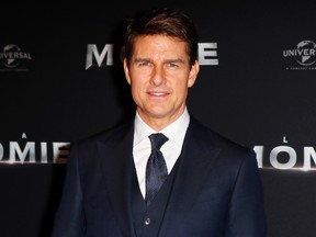 In this Tuesday, May 30, 2017, file photo, Tom Cruise poses during a photocall for the French premiere of "The Mummy" in Paris, France. Production has shut down on “Mission: Impossible 6” due to Cruise’s broken ankle. Paramount Pictures said Wednesday, Aug. 16, 2017, that production will go on hiatus while Cruise makes a full recovery.
Cruise broke his ankle while performing a stunt for the film during its London-based shoot. (AP Photo/Francois Mori, File)