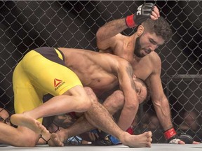 Aiemann Zahabi, right, from Montreal battles Brazilian Reginaldo Vieira at UFC Fight Night in Halifax on Feb. 19, 2017. In his next fight, Zahabi will face Ricardo Ramos at UFC 217 at Madison Square Garden in New York City on Nov. 4. (Andrew Vaughan/THE CANADIAN PRESS)