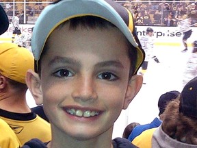 This undated file photo provided by Bill Richard shows his son, Martin Richard, in Boston. Martin was 8 years old when he was killed by the second of two bombs that exploded near the Boston Marathon finish line on April 15, 2013. An official groundbreaking for a park named in honor of the young bombing victim, will be held on Wednesday, Aug. 16, 2017, in Boston. (Bill Richard via AP, File)