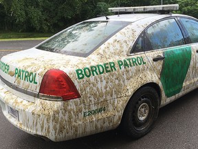 This Aug. 3, 2017 photo provided by U.S. Customs and Border Protection shows a U.S. Border Patrol car that had been sprayed with manure in Alburgh, Vt. (U.S. Customs and Border Protection via AP)