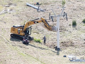 Crews are on site at Adanac Ski Hill dismantling the old chairlift in Sudbury, Ont. on Wednesday August 16, 2017. A new lift is being installed for the upcoming ski season. Gino Donato/Sudbury Star/Postmedia Network