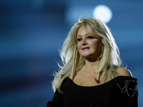 In this May 17, 2013, file photo, Bonnie Tyler performs her song "Believe in Me" during a rehearsal for the final of the Eurovision Song Contest at the Malmo Arena in Malmo, Sweden. Royal Caribbean announced on Aug. 16, 2017, that Tyler will perform her hit “Total Eclipse of the Heart” at sea on the day of the total eclipse Monday during a "Total Eclipse Cruise." (AP Photo/Alastair Grant, File)