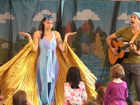 Robyn Northall and Charlie Kert perform ROCKgarden Party!, an interactive environmental tale that educates children about the environment at the Sudbury Public Library as part of the Summer Reading Club in Sudbury, Ont. on Wednesday August 16, 2017. Gino Donato/Sudbury Star/Postmedia Network