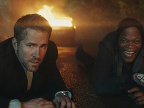 Michael Bryce (Ryan Reynolds) and Darius Kincaid (Samuel L. Jackson) in "The Hitman's Bodyguard." (Courtesy of Lionsgate Entertainment)