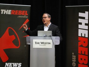 Rebel Media's Ezra Levant speaks to a large crowd at an anti carbon tax rally held at the Westin Hotel in Calgary on Sunday December 11, 2016. (GAVIN YOUNG/POSTMEDIA NETWORK)