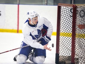Zach Hyman gathers pucks at the end of a Maple Leafs practice at the MasterCard Centre in Toronto on April 11, 2017. (Ernest Doroszuk/Toronto Sun/Postmedia Network)