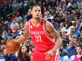K.J. McDaniels #32 of the Houston Rockets handles the ball against the Dallas Mavericks on October 28, 2016 at the American Airlines Center in Dallas, Texas. (Glenn James/NBAE via Getty Images)