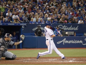 Josh Donaldson of the Toronto Blue Jays hits a solo home run in the fifth inning during MLB action against the Tampa Bay Rays at Rogers Centre on Aug. 17, 2017. (Tom Szczerbowski/Getty Images)