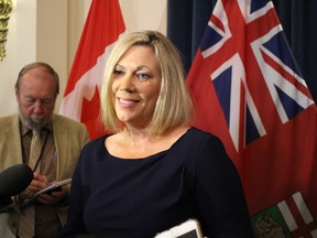 Rochelle Squires answers media questions just after being named Minister of Sustainable Development on Thursday, Aug. 17, 2017 in Winnipeg. Many considered the move a promotion from Squires' previous post as Minister of Sport, Culture and Heritage. JOYANNE PURSAGA/Winnipeg Sun/Postmedia Network