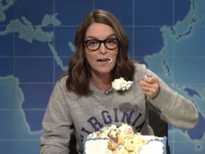 Tina Fey returned to Weekend Update on Thursday to criticize white supremacists during a cake-eating rant. (Facebook/SNL)