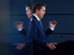 Leader of the Conservative Party of Canada, Andrew Scheer, makes an announcement and holds a media availability at the National Press Theatre in Ottawa on Thursday, July 20, 2017. A pledge by Conservative Leader Andrew Scheer to yank federal funding from universities that fail to uphold free speech wouldn't apply to a decision by the University of Toronto to ban a nationalist rally from campus, his spokesman said Wednesday. (Sean Kilpatrick/THE CANADIAN PRESS)