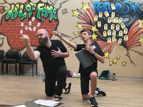 Director Richard Teskey gives Gabe Rowland-Renaud some acting tips during a rehearsal for the ACT II presentation of “Into the Woods.” On Saturday, Aug. 19, some of the cast will read fairy tales in character at The Book Keepers at 1 p.m. (Photo courtesy of Sarnia Rebound)