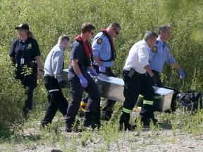 The body of a teen who drowned while swimming in the Red River was recovered today close to the Harry Lazarenko Bridge. Friday, August 18, 2017. Chris Procaylo/Winnipeg Sun