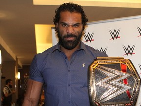 World Wrestling Entertainment champion Jinder Mahal, of Calgary, poses with his WWE Championship during international media day in Brooklyn, N.Y. Mahal defends his title at SummerSlam on Sunday versus Japanese sensation Shinsuke Nakamura. (George Tahinos/SLAM! Wrestling)