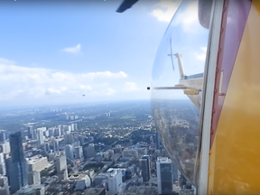 In preparation for the presentation of new colours from the Governor General, the Royal Canadian Air Force conducted an "airborne media briefing" over Toronto on Friday, Aug. 18, 2017. (Dave Abel/Toronto Sun)