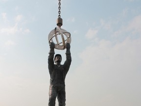 The Big Piece of the Puzzle 6.7-metre (22-foot) bronze statue at the West River's Edge Boat Launch in Fort Saskatchewan was vandalized over the August long weekend. A city staff member alerted RCMP to the vandalism on Aug. 6, 2017. Leanne Delong/Postmedia