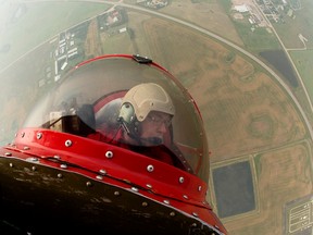 Barry Pendrak flies his Skybolt aerobatic biplane near the Villeneuve Airport, prior to the start of the Edmonton Airshow, Friday Aug. 18, 2017. Photo by David Bloom