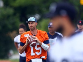 Ricky Ray looks for a pass during Argos practice at Father Henry Carr Catholic Secondary School in Toronto on Aug. 14, 2017. (Dave Abel/Toronto Sun/Postmedia Network)