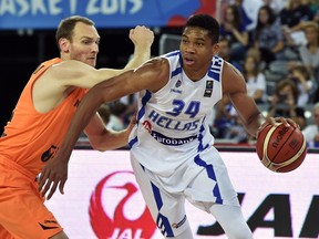 Greece's forward Giannis Antetokounmpo (R) vies with Netherlands' forward Kees Akerboom at the EuroBasket 2015 in Zagreb on September 10, 2015. (Andrej Isakovic/AFP/Getty Images)