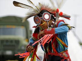John Tootoosis performs a traditional First Nations dance at the graduation ceremony for the Canadian Armed Forces’ Bold Eagle program held at the 3rd Canadian Division Support Base Edmonton Detachment Wainwright near Wainwright, Alberta on Thursday August 10, 2017. This year marks Bold Eagle’s 28th anniversary. Approximately 100 recruits from across Western Canada participated this year, which included Canadian Armed Forces and Indigenous traditions. (PHOTO BY LARRY WONG/POSTMEDIA)