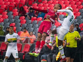 Fury FC’s Steevan Dos Santos and Tampa Bay Rowdies’ Damion Lowe battle for the ball when the teams met earlier this season. (ASHLEY FRASER/Postmedia Network)
