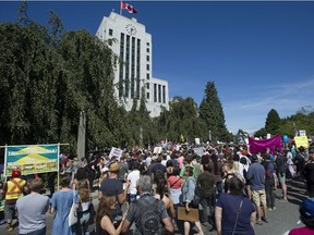 Thousands of people surrounded Vancouver City Hall Saturday, Aug. 19, 2017 to attend a counter rally in protest of a planned anti-Muslim rally that was to take place at city hall Saturday afternoon. (Jason Payne/POSTMEDIA)