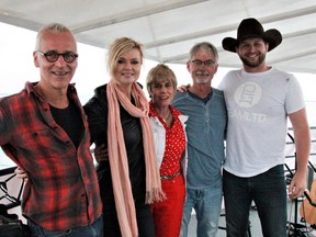 Pianist Kenny Munchaw, singer-songwriter Beverly Mahood, Bonnie Kogos and Jamie Warren aboard The Heron, the North Channel Cruise Boat for the Songwriter Cruise, captained by Chris Blodgett. (Linda Heldman/For The Sudbury Star)