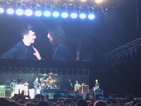 In this screengrab, 80's pop star Rick Astley joins the stage with Foo Fighters frontman Dave Grohl during the Summer Sonic Festival on August 20, 2017 in Tokyo, Japan. (YouTube/Aaron Tan)