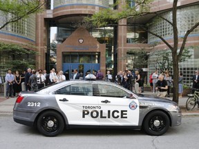 Toronto Police Chief Mark Saunders unveiled the new design for police cars following public consultation on Monday August 21, 2017. (Michael Peake/Toronto Sun)