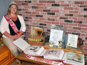 Shannon Little (left) was busy during her reign as the 2016-17 Perth County Queen of the Furrow and will reach more than 100 official events in this, the 100th year of the International Plowing Match (IPM). She has a few scrapbooks completed capturing the successful year. ANDY BADER/MITCHELL ADVOCATE
