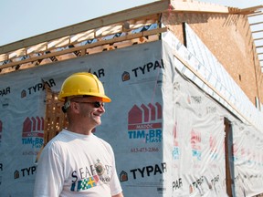 Taylor BertelinkThe /Intelligencer
Pastor Harry Toews is all smiles for the construction of the new Madoc Baptist Church. Ten years ago the land was purchased but the construction of the church by volunteers didnâÄôt begin until August 14.