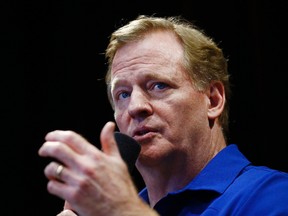 This Aug. 14, 2017, file photo shows NFL Commissioner Roger Goodell talking with Arizona Cardinals football team season ticket holders at University of Phoenix Stadium, in Glendale, Ariz. (AP Photo/Ross D. Franklin, File)
