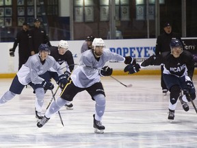 BioSteel pro hockey camp participants go for a skate during a workout in Toronto on Aug. 21, 2017. (Stan Behal/Toronto Sun/Postmedia Network)