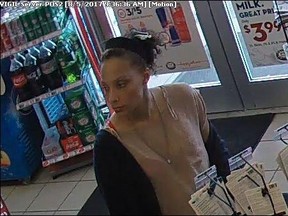 Kingston Police are seeking this woman in connection with an investigation into credit card fraud earlier this month. (Kingston Police)