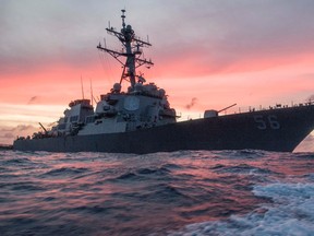In this Jan. 22, 2017, photo provided by U.S. Navy, the USS John S. McCain conducts a patrol in the South China Sea while supporting security efforts in the region. (James Vazquez/U.S. Navy via AP)